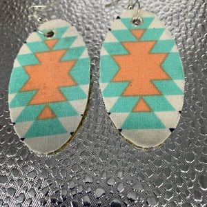 This astonishing custom brand made earrings by Not Just Baskets.